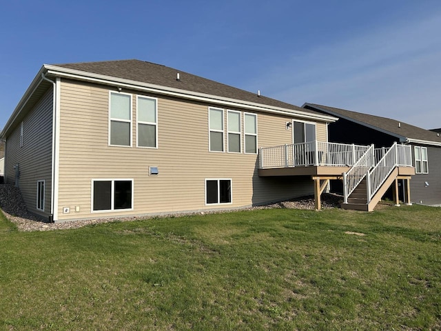 704 River Ridge Drive, Waterford, WI 53185 - rear view of house featuring a deck, a yard, and stairway