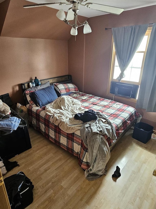 419 N 3rd Ave, Wausau, WI 54401 - bedroom featuring wood finished floors, ceiling fan, and vaulted ceiling