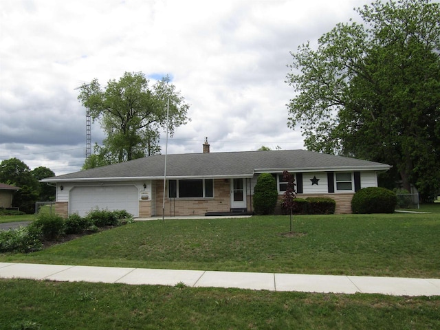 2374 S Park Ave, Beloit, WI 53511 - single story home with a garage, a front yard, a chimney, and brick siding