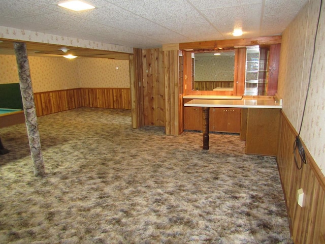 2374 S Park Ave, Beloit, WI 53511 - bar area with carpet flooring, a wainscoted wall, wallpapered walls, and wooden walls