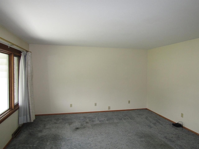 2374 S Park Ave, Beloit, WI 53511 - carpeted empty room with baseboards