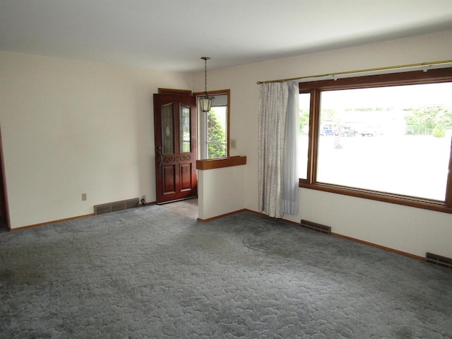 2374 S Park Ave, Beloit, WI 53511 - unfurnished room featuring carpet flooring and baseboards
