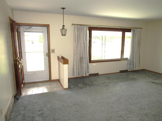 2374 S Park Ave, Beloit, WI 53511 - foyer with carpet floors and baseboards