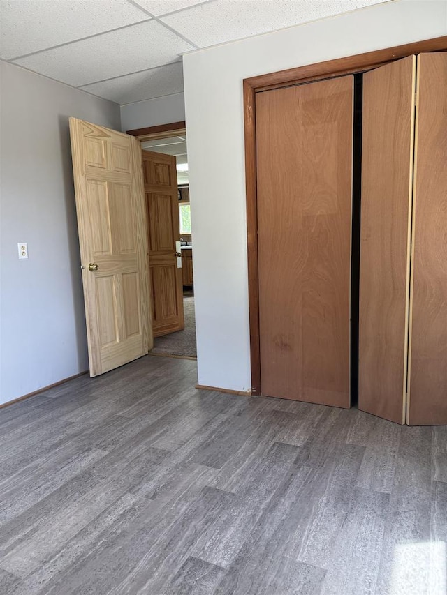 7280 Closing Dam Rd, Cassville, WI 53806 - unfurnished bedroom featuring wood finished floors and a closet