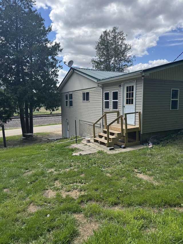 7280 Closing Dam Rd, Cassville, WI 53806 - back of property with a lawn and metal roof