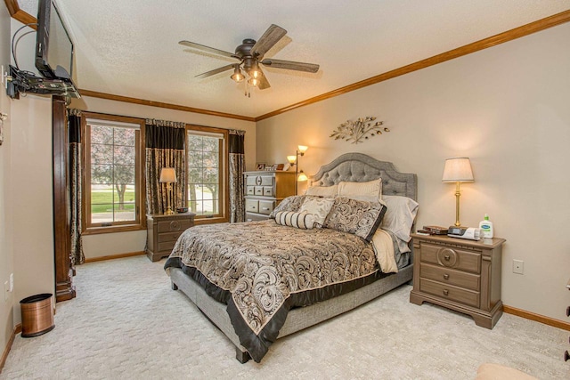 800 Ridge Ave, Platteville, WI 53818 - bedroom featuring light colored carpet, baseboards, crown molding, a textured ceiling, and a ceiling fan
