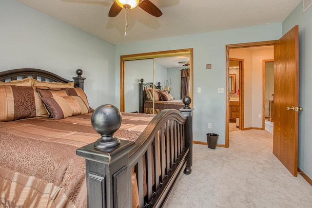 800 Ridge Ave, Platteville, WI 53818 - bedroom with light colored carpet, a closet, baseboards, and ceiling fan