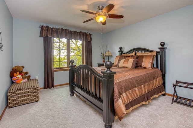800 Ridge Ave, Platteville, WI 53818 - carpeted bedroom with baseboards and a ceiling fan