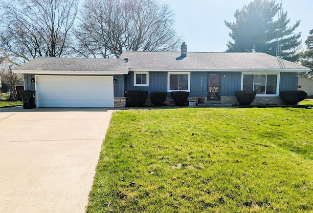 3434 Kentucky St, Racine, WI 53405 - single story home with stone siding, a garage, driveway, and board and batten siding