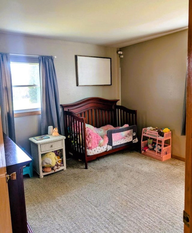 3434 Kentucky St, Racine, WI 53405 - bedroom featuring carpet floors and a crib