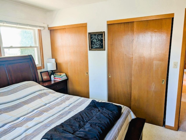 3434 Kentucky St, Racine, WI 53405 - bedroom featuring carpet floors and two closets