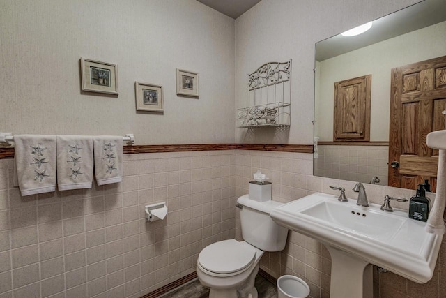 4034 Chicory Rd, Mount Pleasant, WI 53403 - half bathroom with toilet, tile walls, and wainscoting