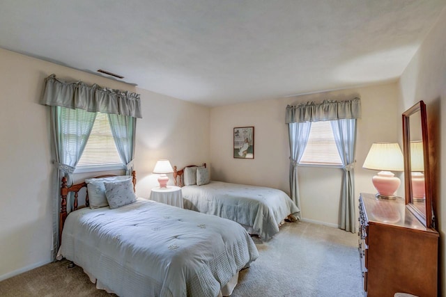 4034 Chicory Rd, Mount Pleasant, WI 53403 - carpeted bedroom featuring baseboards