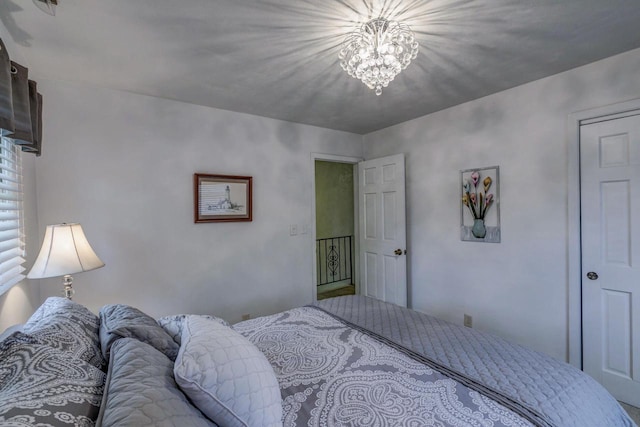 4034 Chicory Rd, Mount Pleasant, WI 53403 - bedroom with a chandelier