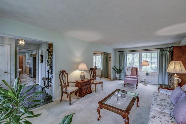 4034 Chicory Rd, Mount Pleasant, WI 53403 - living room with carpet, a baseboard radiator, and baseboards