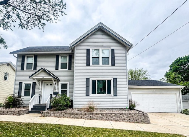 509 E Jefferson St, Stoughton, WI 53589 - view of front of home with concrete driveway and an attached garage