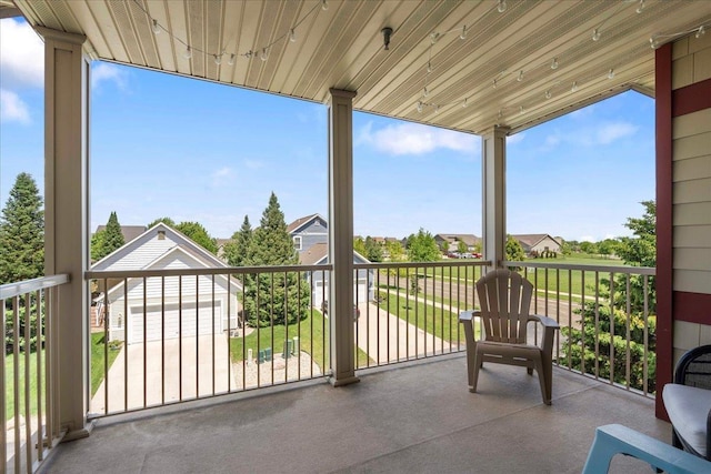 1300 School St Unit 209, Sun Prairie, WI 53590 - view of patio with a balcony and a residential view