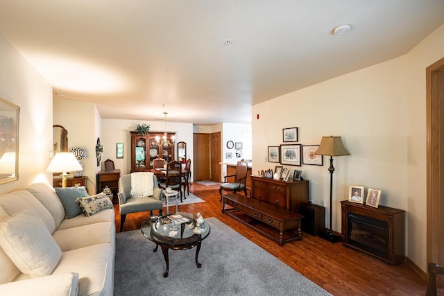 18625 Emerald Cir Unit A, Brookfield, WI 53045 - living room featuring wood finished floors and a chandelier