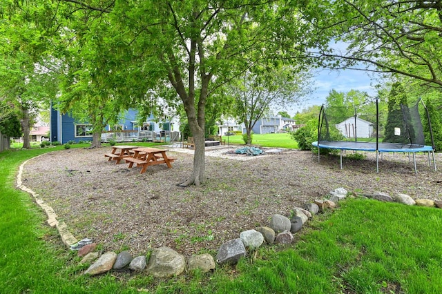 1081 E Elm Rd, Oak Creek, WI 53154 - view of grassy yard with a trampoline