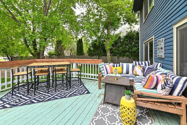 1081 E Elm Rd, Oak Creek, WI 53154 - wooden terrace featuring outdoor lounge area, a fenced backyard, outdoor dining area, and view of scattered trees