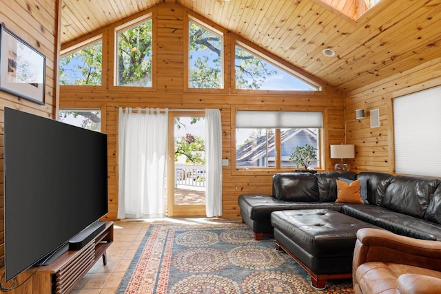 202 Lake St, Mount Horeb, WI 53572 - living room featuring plenty of natural light, high vaulted ceiling, wooden walls, light tile patterned floors, and wood ceiling