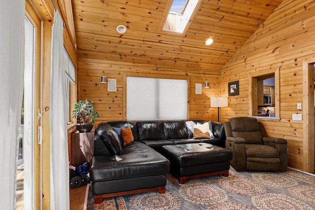 202 Lake St, Mount Horeb, WI 53572 - living area with healthy amount of natural light, wood walls, wooden ceiling, a skylight, and high vaulted ceiling
