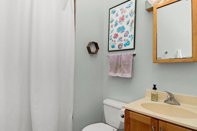 202 Lake St, Mount Horeb, WI 53572 - full bathroom featuring vanity, toilet, and curtained shower