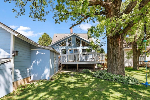 202 Lake St, Mount Horeb, WI 53572 - back of house featuring a deck and a yard