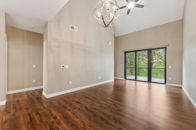 1512 Lake St, Baraboo, WI 53913 - unfurnished room featuring high vaulted ceiling, a chandelier, dark wood-style floors, and baseboards