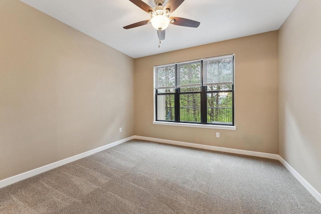 1512 Lake St, Baraboo, WI 53913 - carpeted spare room with baseboards and ceiling fan