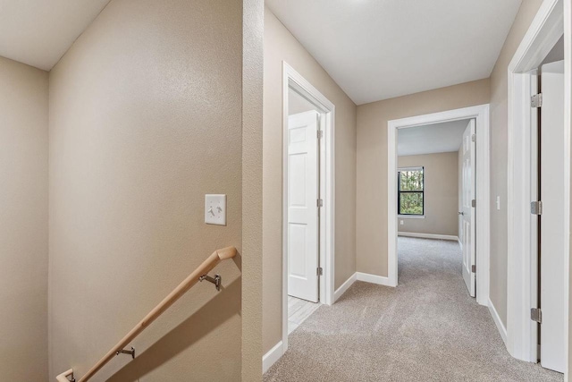 1512 Lake St, Baraboo, WI 53913 - hall featuring light colored carpet and baseboards