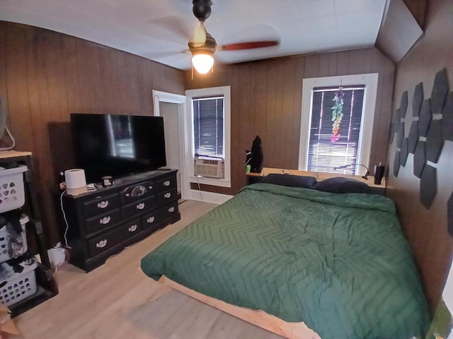 206 W Winnebago St, Appleton, WI 54911 - bedroom with wood walls, cooling unit, a ceiling fan, wood finished floors, and vaulted ceiling