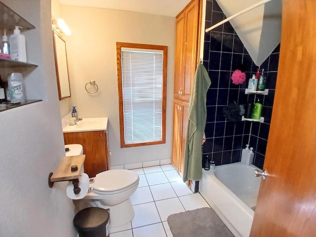 206 W Winnebago St, Appleton, WI 54911 - bathroom with tile patterned flooring, vanity, toilet, and shower / tub combo with curtain