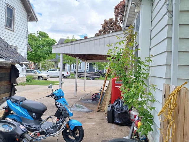 206 W Winnebago St, Appleton, WI 54911 - view of car parking with a carport