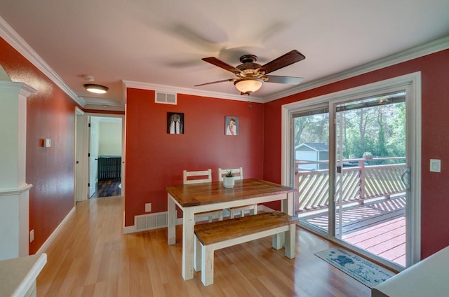 1621 W Crystal Dr, Edgerton, WI 53534 - dining room with light wood-style floors, ornamental molding, and ceiling fan
