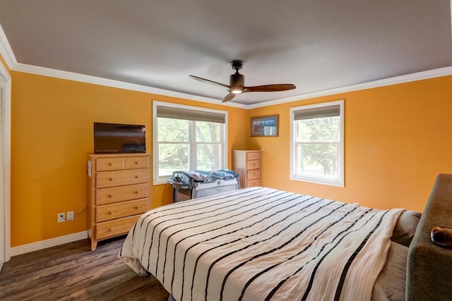 1621 W Crystal Dr, Edgerton, WI 53534 - bedroom featuring dark wood-style floors, ornamental molding, and a ceiling fan