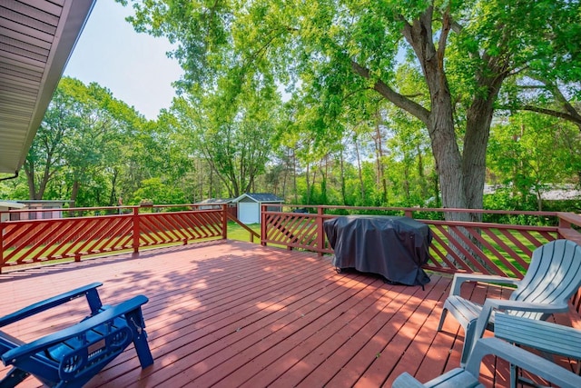 1621 W Crystal Dr, Edgerton, WI 53534 - deck featuring a storage shed and a grill