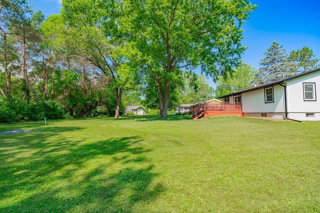 1621 W Crystal Dr, Edgerton, WI 53534 - view of green lawn featuring a wooden deck