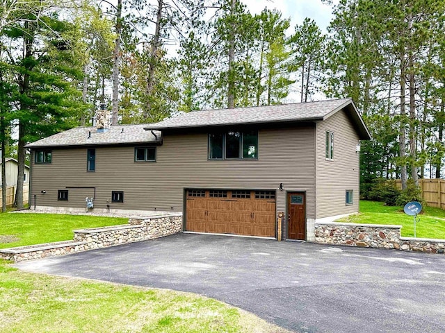 N11893 Pratt Rd, Elcho, WI 54428 - view of front of house featuring driveway and a garage