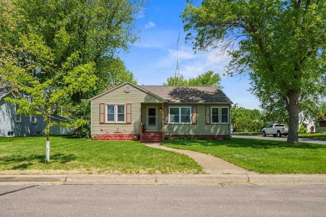 60 Madison Ave, Port Edwards, WI 54469 - view of front of house featuring a front lawn and crawl space