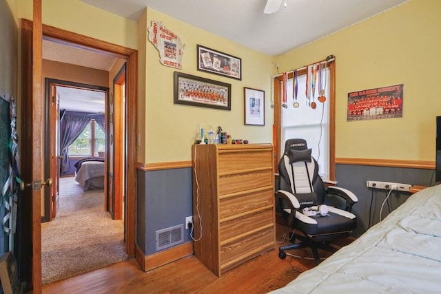 60 Madison Ave, Port Edwards, WI 54469 - bedroom featuring wood finished floors, a ceiling fan, and a desk