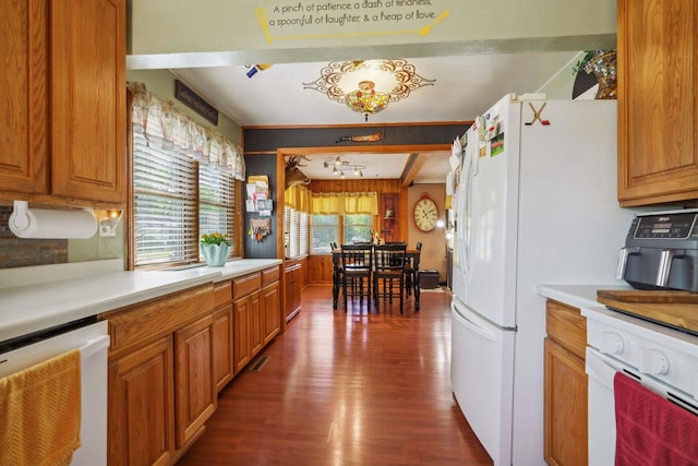 60 Madison Ave, Port Edwards, WI 54469 - kitchen featuring white appliances, wood finished floors, light countertops, brown cabinets, and beamed ceiling