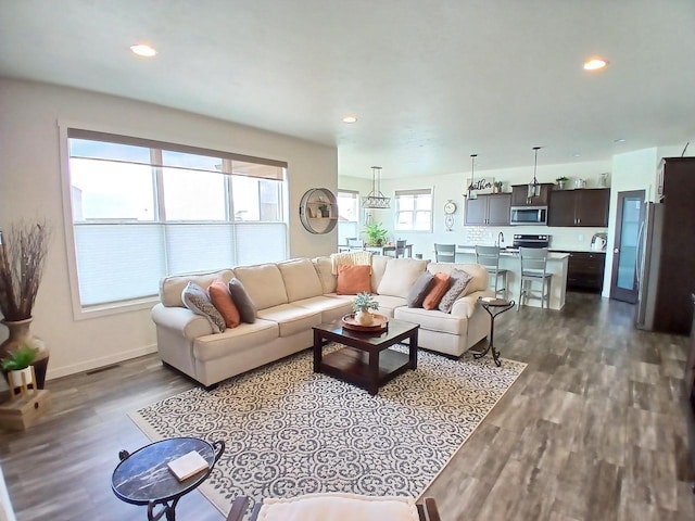 1890 Red Fox Ln, Kaukauna, WI 54130 - living room with dark wood-style flooring, recessed lighting, and baseboards