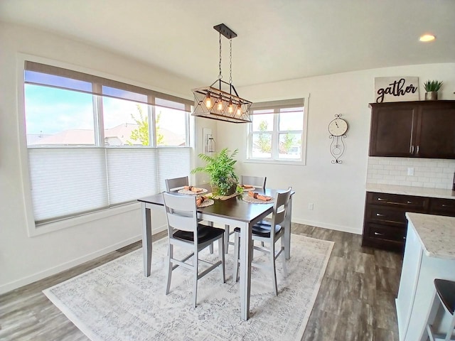1890 Red Fox Ln, Kaukauna, WI 54130 - dining room with dark wood-type flooring and baseboards