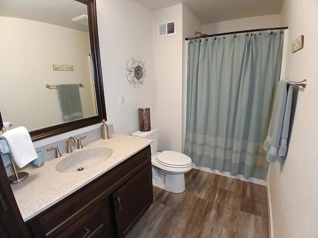 1890 Red Fox Ln, Kaukauna, WI 54130 - full bath with wood finished floors, vanity, toilet, and curtained shower