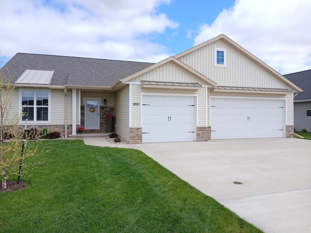 1890 Red Fox Ln, Kaukauna, WI 54130 - view of front of house featuring concrete driveway, stone siding, a garage, and roof with shingles