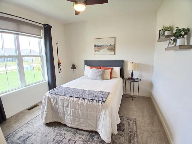1890 Red Fox Ln, Kaukauna, WI 54130 - carpeted bedroom with baseboards and a ceiling fan