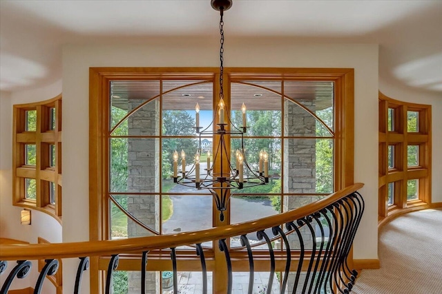 6625 Charles St, Racine, WI 53402 - detailed view of a chandelier, carpet, and baseboards
