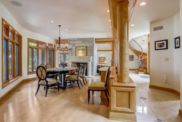 6625 Charles St, Racine, WI 53402 - dining space with baseboards, a chandelier, recessed lighting, and stairway