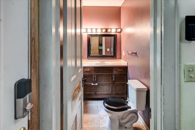 1235 Chandler St, Madison, WI 53715 - bathroom featuring toilet, vanity, and tile patterned floors